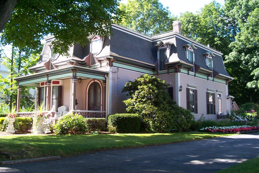 More modest in stature but grand in ornamentation this French Second Empire with mansard roof is stunning.