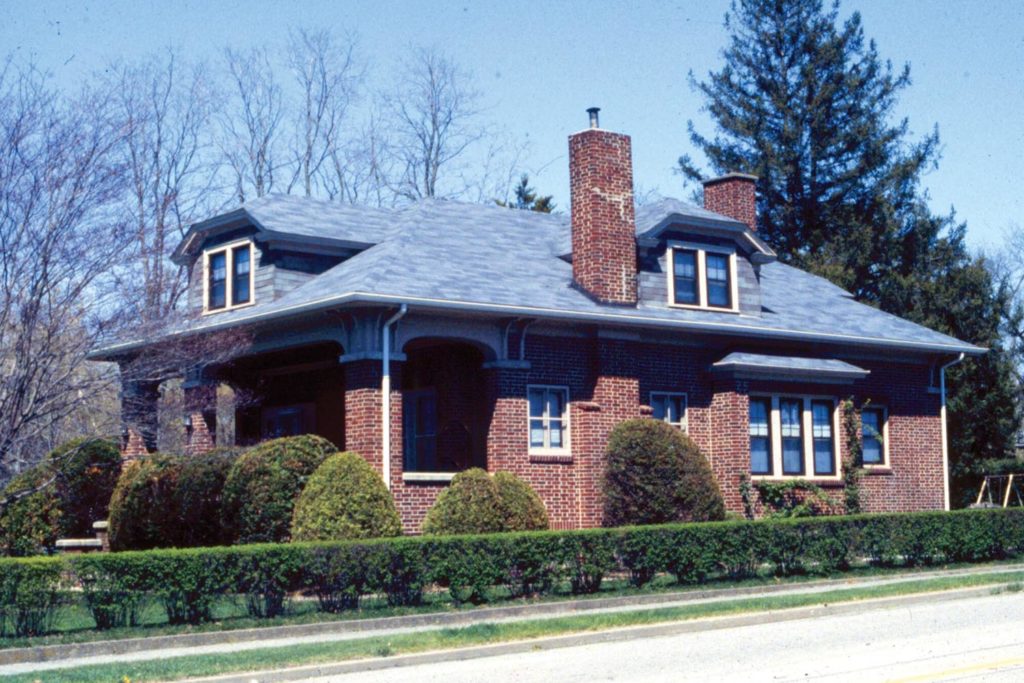 This bungalow was completed in brick. Its low slung design is typical for the style.