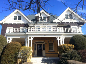 This house is a hybridization of the two styles, Shingle and Tudor.