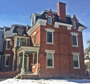 This house is an example of the panel-Brick Mansard style, and was all the rage in the 1880s.