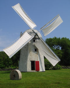 Restored windmill in with fabric sails.